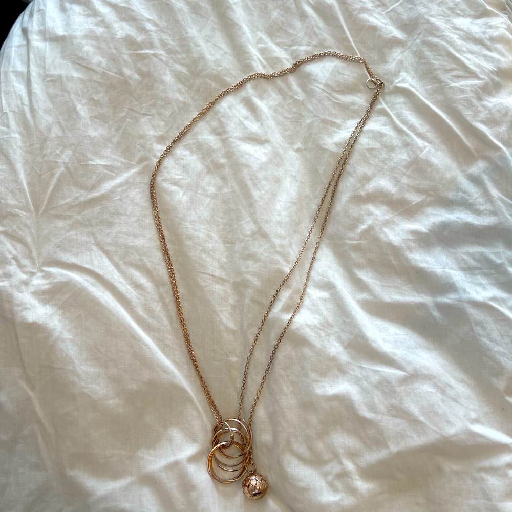 Long gold necklace